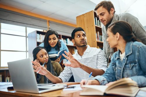 Students working together in a study group at the library