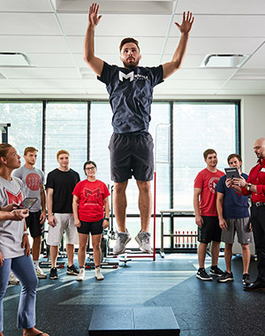 Group of students in a practical class at the gym