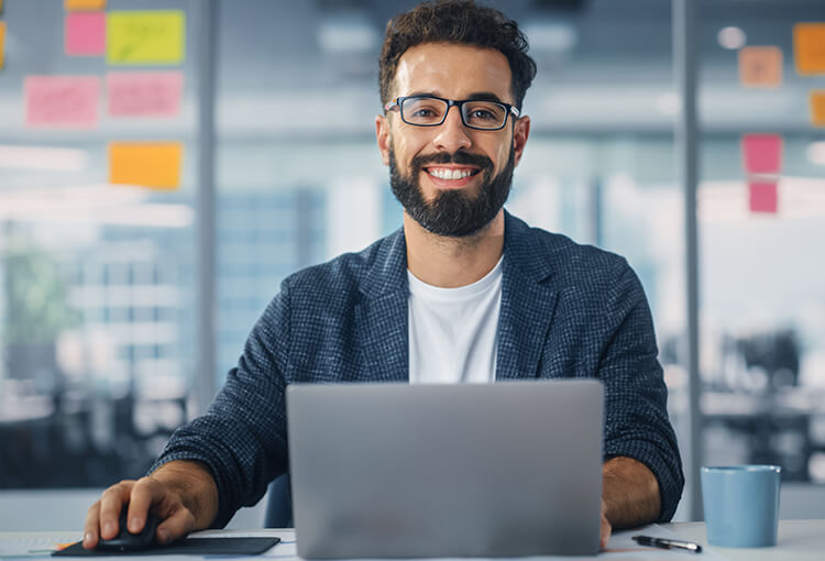 Accounting professional working on laptop