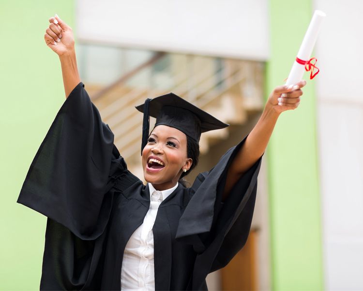 Female graduate celebrating.