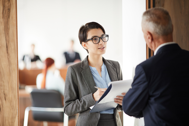 Investigative reporter conducts an interview.