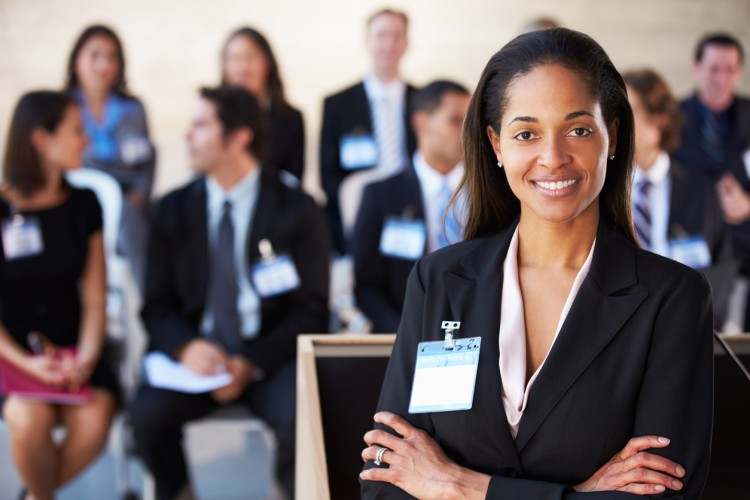 A nonprofit program coordinator hosts a conference